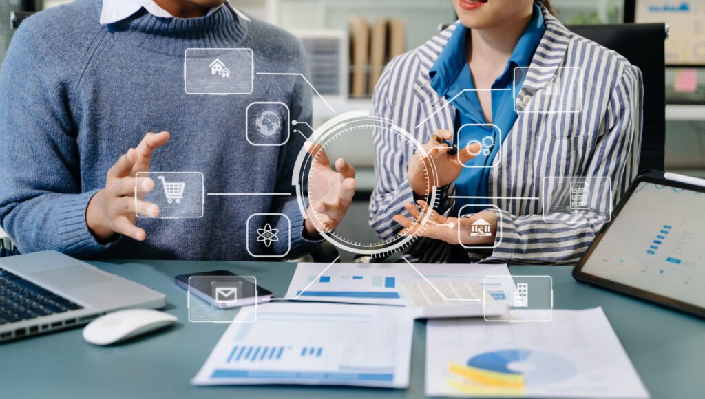 Business professionals discussing local citation strategies with digital icons representing analytics, e-commerce, and communication tools, emphasising optimisation for Google rankings.